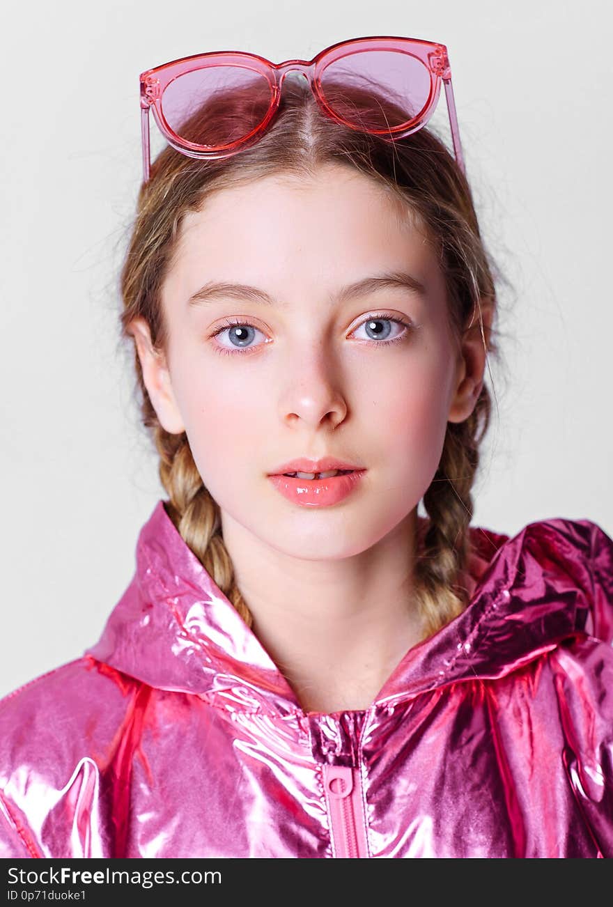 Portrait of little model girl in studio