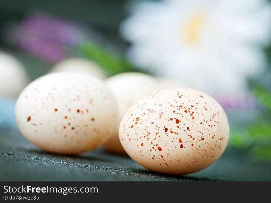 Color easter eggs on the table, easter background