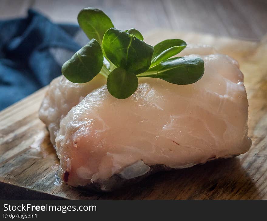 Raw cod on a table