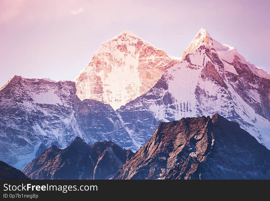 View of Mount Kangtega in Himalaya mountains at sunrise. Khumbu valley, Everest region, Nepal. View of Mount Kangtega in Himalaya mountains at sunrise. Khumbu valley, Everest region, Nepal