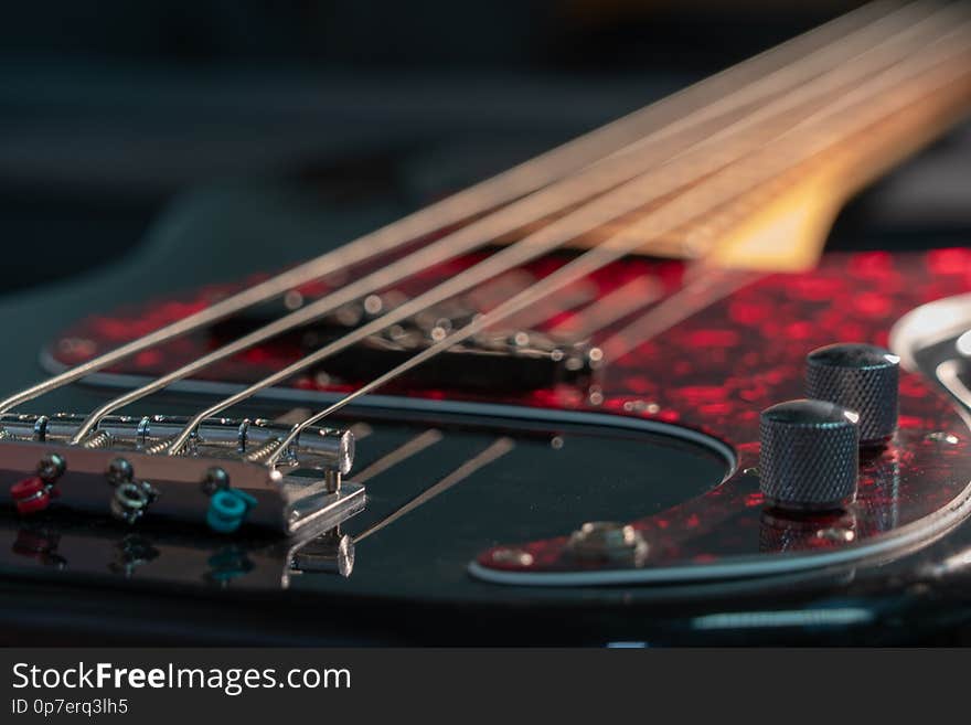 A Close-up of a black electric bass