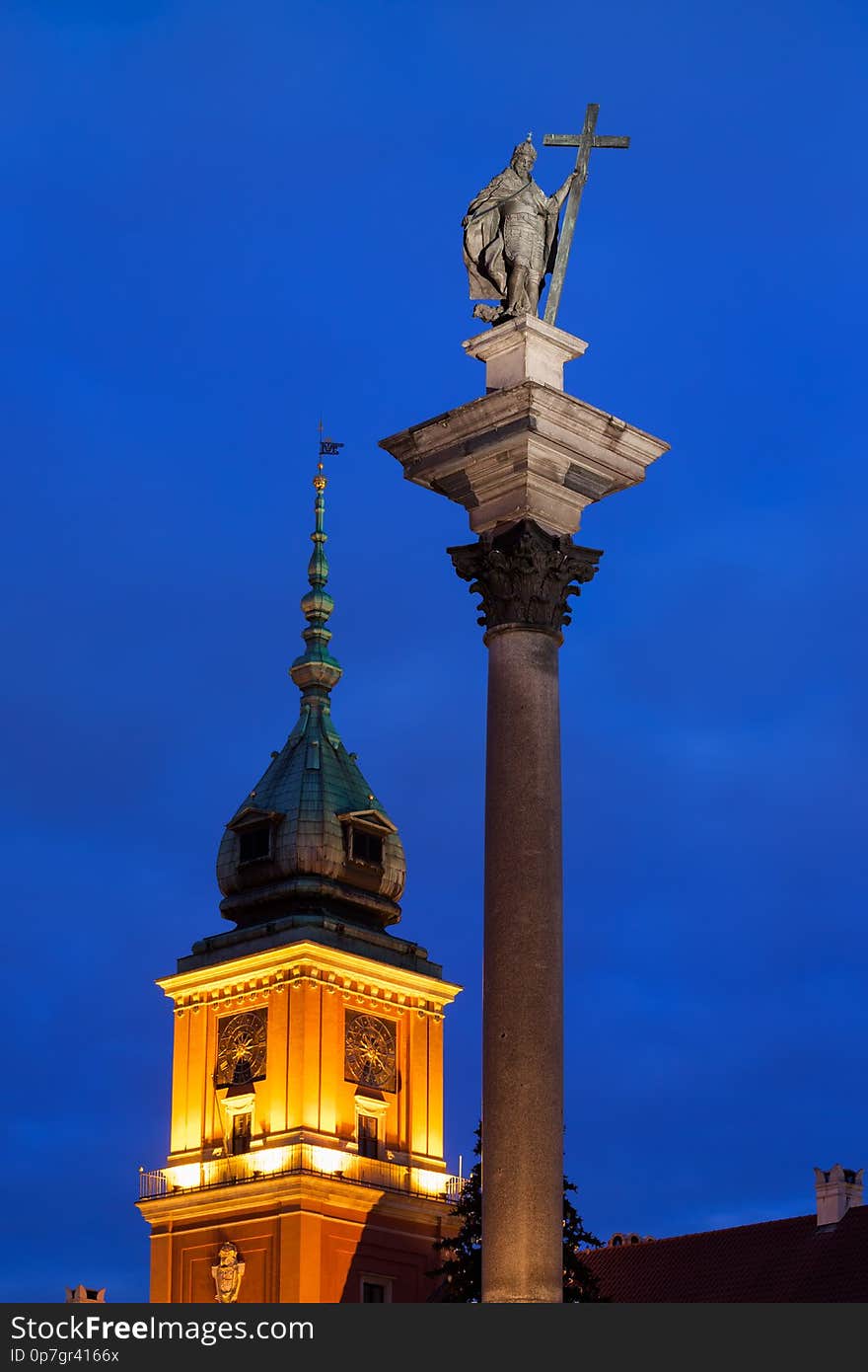 King Sigismund III Vasa column and clocktower of the Royal Castle at night, city of Warsaw, Poland. King Sigismund III Vasa column and clocktower of the Royal Castle at night, city of Warsaw, Poland