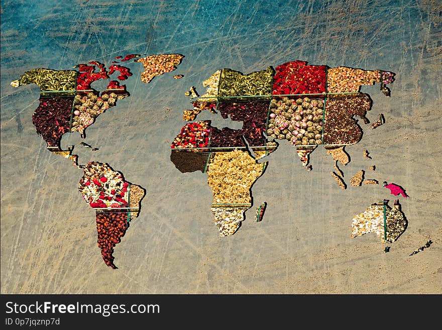 Roughly outlined world map with veraity of spice filling