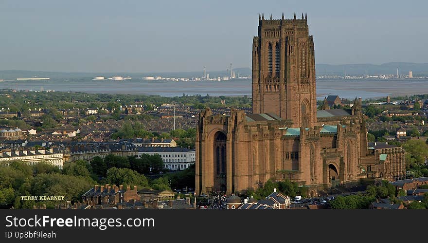 Liverpool Cathedral is the Church of England Cathedral of the Diocese of Liverpool, built on St James&#x27;s Mount in Liverpool and is the seat of the Bishop of Liverpool. It may be referred to as the Cathedral Church of Christ in Liverpool or the Cathedral Church of the Risen Christ, Liverpool, being dedicated to Christ &#x27;in especial remembrance of his most glorious Resurrection&#x27; The cathedral is based on a design by Giles Gilbert Scott. The total external length of the building, including the Lady Chapel, is 207 yards &#x28;189 m&#x29; making it the longest cathedral in the world its internal length is 160 yards &#x28;150 m&#x29;. In terms of overall volume, Liverpool Cathedral ranks as the fifth-largest cathedral in the world and contests with the incomplete Cathedral of Saint John the Divine in New York City for the title of largest Anglican church building. With a height of 331 feet &#x28;101 m&#x29; it is also one of the world&#x27;s tallest non-spired church buildings and the third-tallest structure in the city of Liverpool. The cathedral has been designated by English Heritage as a Grade I listed building. The Anglican Cathedral is one of two in the city. The other, the Roman Catholic Metropolitan Cathedral of Liverpool, is situated approximately half a mile to the north. The Cathedrals are linked by Hope Street, which takes its name from William Hope, a local merchant whose house stood on the site now occupied by the Philharmonic Hall, and was named long before either Cathedral was built. Liverpool City Centre Spring 2014. Liverpool Cathedral is the Church of England Cathedral of the Diocese of Liverpool, built on St James&#x27;s Mount in Liverpool and is the seat of the Bishop of Liverpool. It may be referred to as the Cathedral Church of Christ in Liverpool or the Cathedral Church of the Risen Christ, Liverpool, being dedicated to Christ &#x27;in especial remembrance of his most glorious Resurrection&#x27; The cathedral is based on a design by Giles Gilbert Scott. The total external length of the building, including the Lady Chapel, is 207 yards &#x28;189 m&#x29; making it the longest cathedral in the world its internal length is 160 yards &#x28;150 m&#x29;. In terms of overall volume, Liverpool Cathedral ranks as the fifth-largest cathedral in the world and contests with the incomplete Cathedral of Saint John the Divine in New York City for the title of largest Anglican church building. With a height of 331 feet &#x28;101 m&#x29; it is also one of the world&#x27;s tallest non-spired church buildings and the third-tallest structure in the city of Liverpool. The cathedral has been designated by English Heritage as a Grade I listed building. The Anglican Cathedral is one of two in the city. The other, the Roman Catholic Metropolitan Cathedral of Liverpool, is situated approximately half a mile to the north. The Cathedrals are linked by Hope Street, which takes its name from William Hope, a local merchant whose house stood on the site now occupied by the Philharmonic Hall, and was named long before either Cathedral was built. Liverpool City Centre Spring 2014