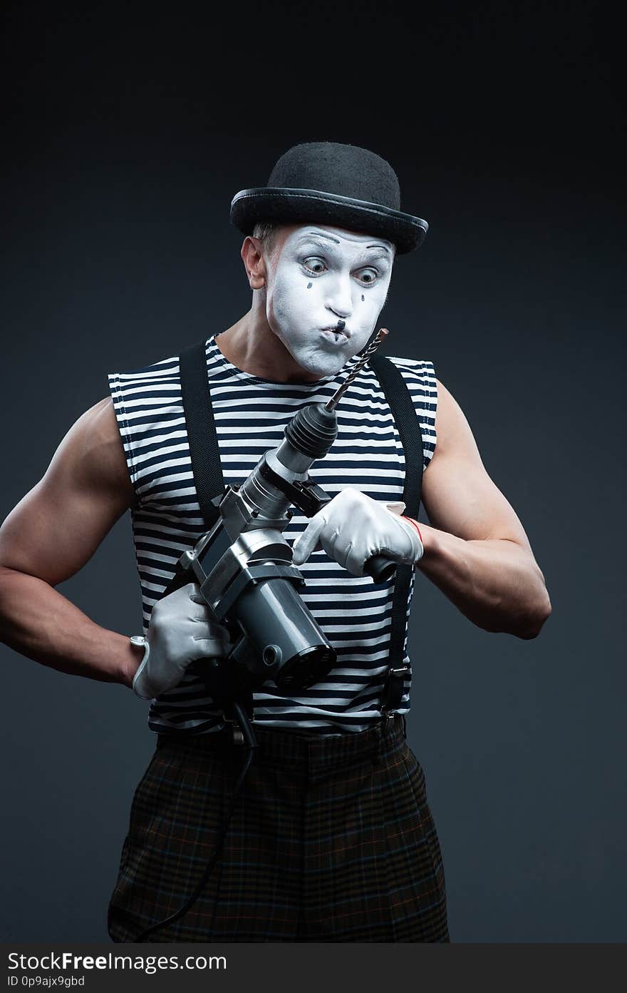 Aggressive Mime Holding Puncher