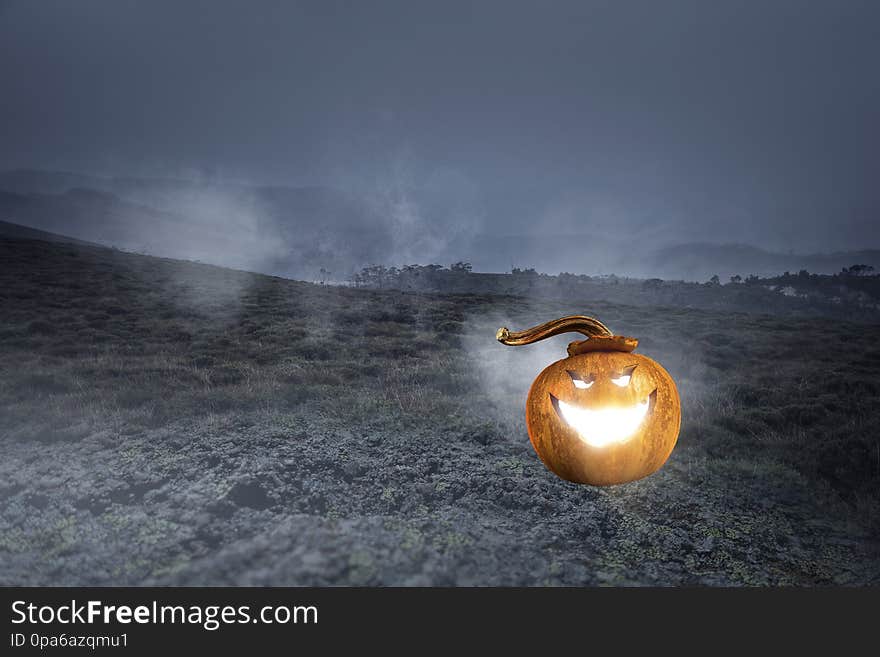 Halloween pumpkin in a mystic forest at night. Mixed media. Halloween pumpkin in a mystic forest at night. Mixed media