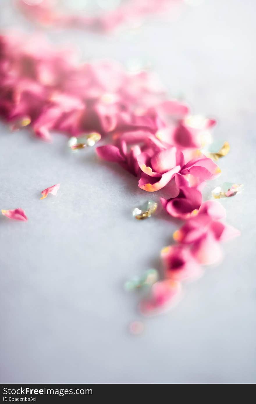 Delicate rose petals on marble stone - art of flowers, luxury background and floral beauty concept. A touch of romance