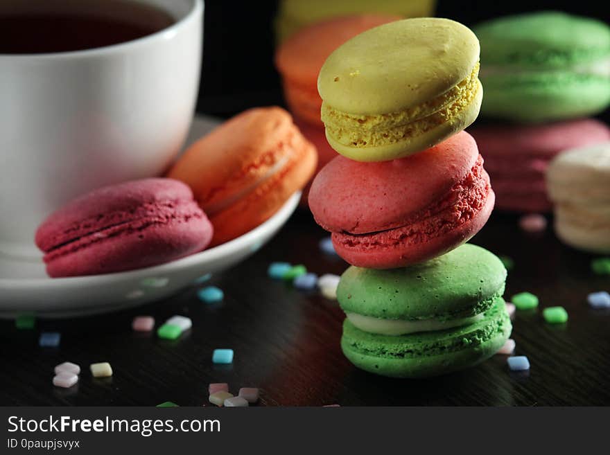 Macaroons different colors in dark light space. Macaroons different colors in dark light space