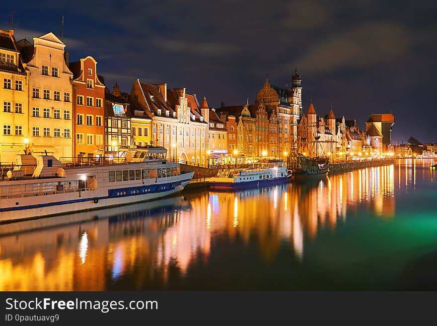 Night view of Gdansk harbor and Motlawa river, located in the Old Town of Gdansk city, Poland