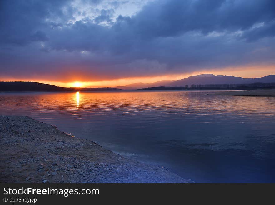 Sunset,sunrise Landscape,panorama.Beautiful Nature.Blue Sky,amazing Colorful Clouds.Natural Background.Artistic Wallpaper.Lake,sun