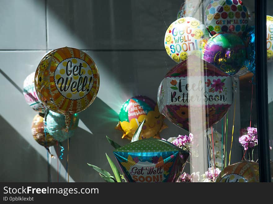 Local Gift Store facade with Celebration Balloons on Display.