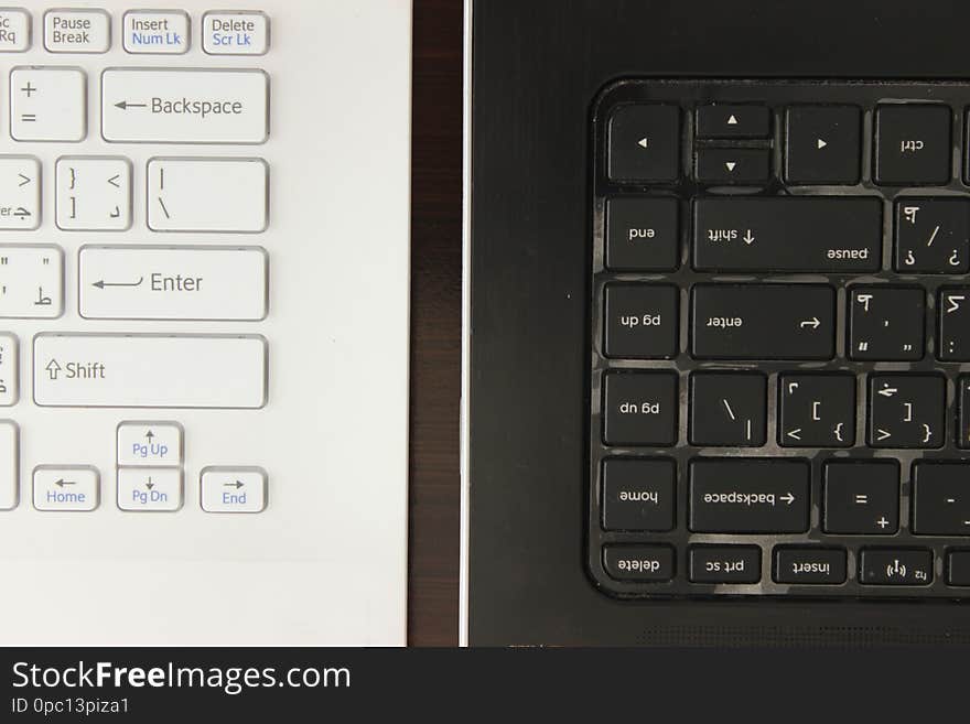 Keyboard and computer laptops in office