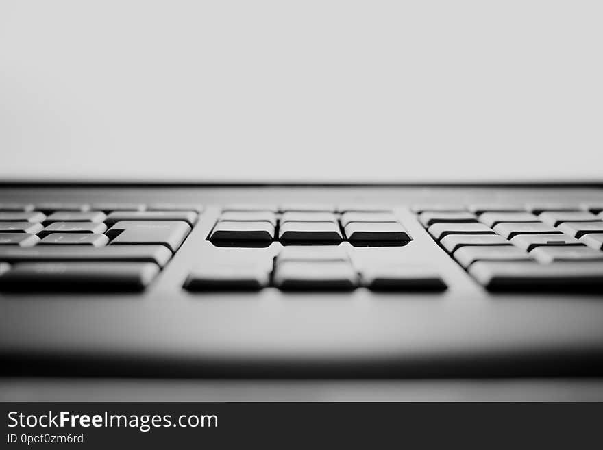 Horizontal black and white keyboard keys bokeh background