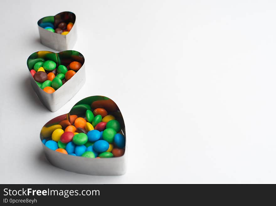 A bowl of multicolor chocolate candies