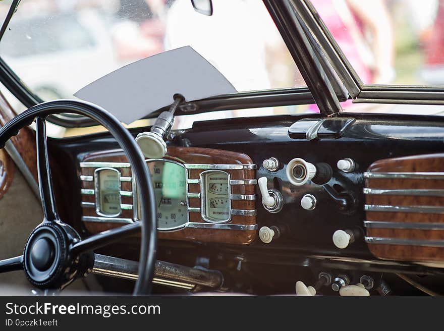 Wheel car of mid-20th century. Shot. Interior of old car with radio and control keys. Interior inside the Soviet machine. Concept