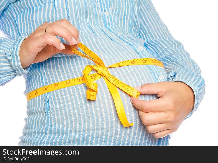 Happy Pregnant Girl Lies On White Background