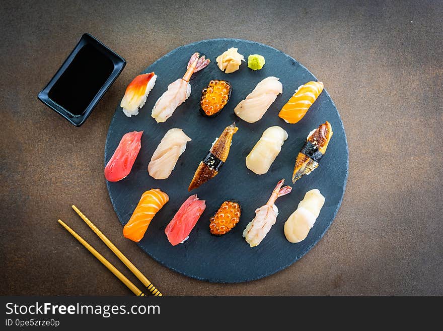 Nigiri sushi set with salmon tuna shrimp prawn eel shell and other sashimi