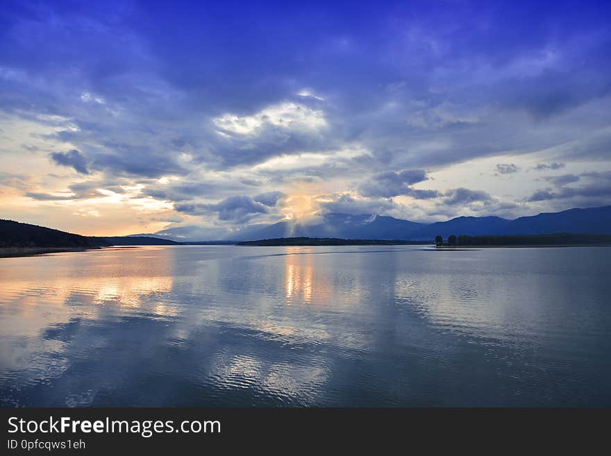 Sunset,sunrise Landscape,panorama.Beautiful Nature.Blue Sky,amazing colorful clouds.Natural Background.Artistic Wallpaper.Lake,sun