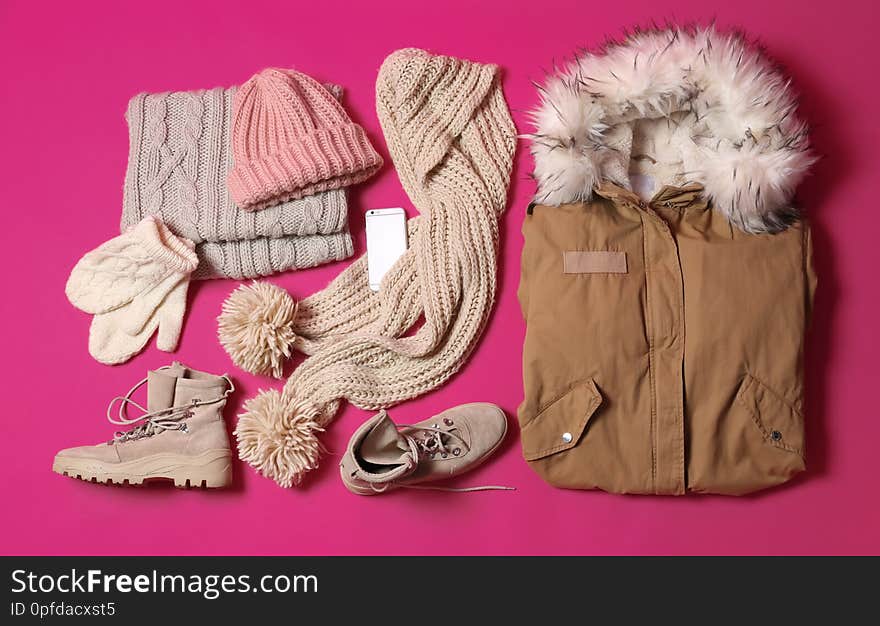 Flat Lay Composition With Warm Clothes For Winter Vacation