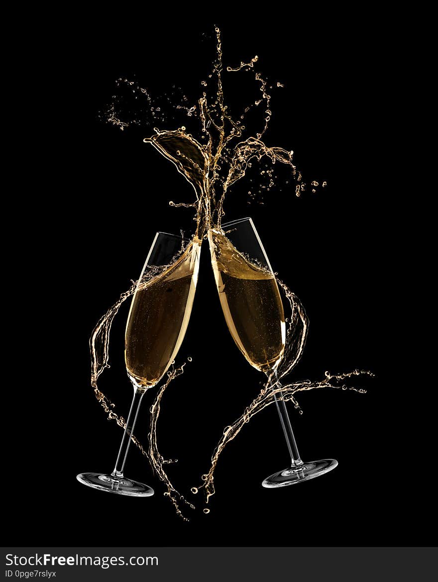 Glasses of champagne clinking together and splashing on black background