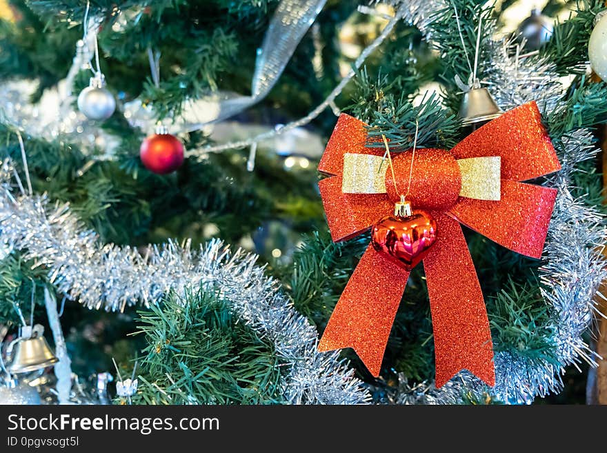 Various accessories such as bow bells, balls on the Christmas tree