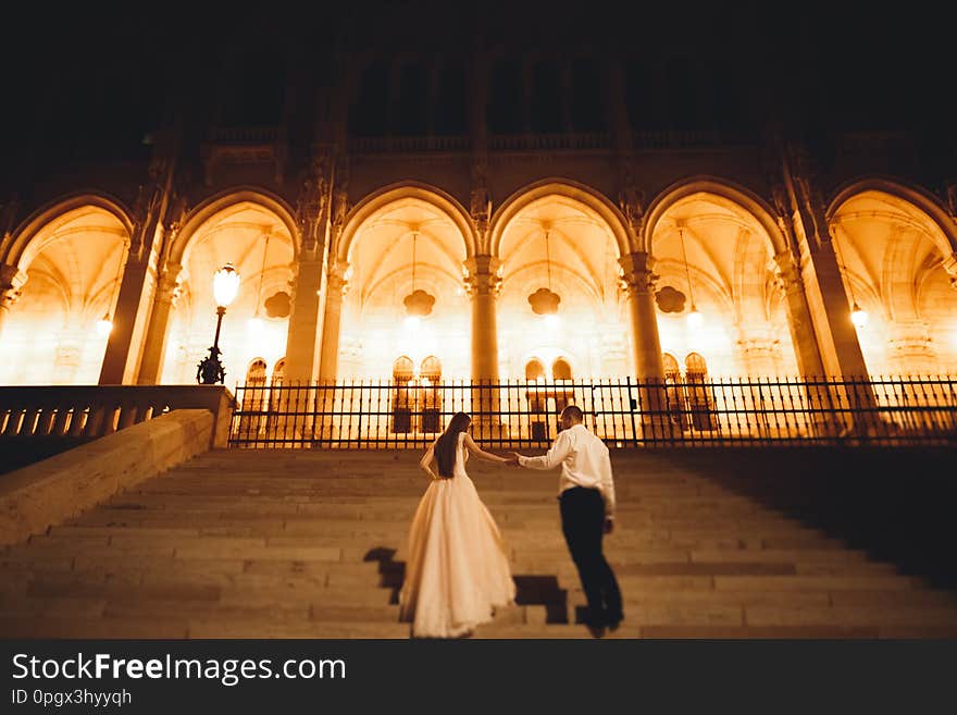 Caucasian happy romantic young couple celebrating their marriage. Outdoor.