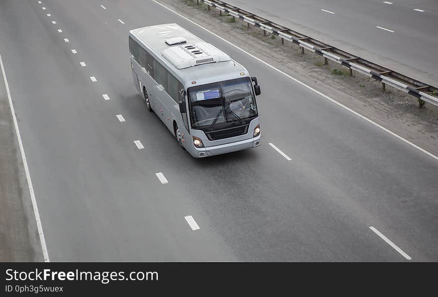 bus goes on the country highway. bus goes on the country highway