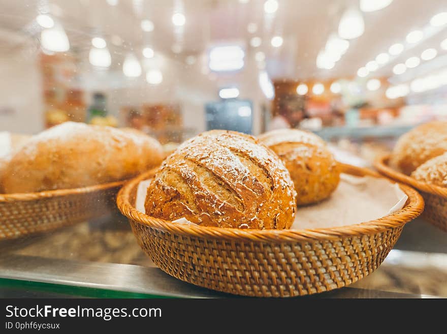 Closeup of bread in the bakery shop. Fresh bread. Organic bread background. Bali island. Indonesia.