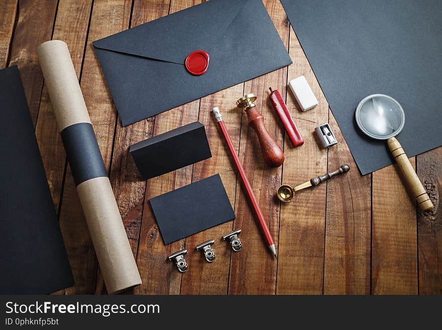 Blank vintage stationery on wood table background. Responsive design template. Mockup for branding identity