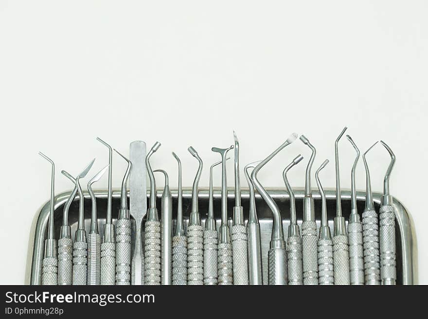 Group of dentist tools  on white background