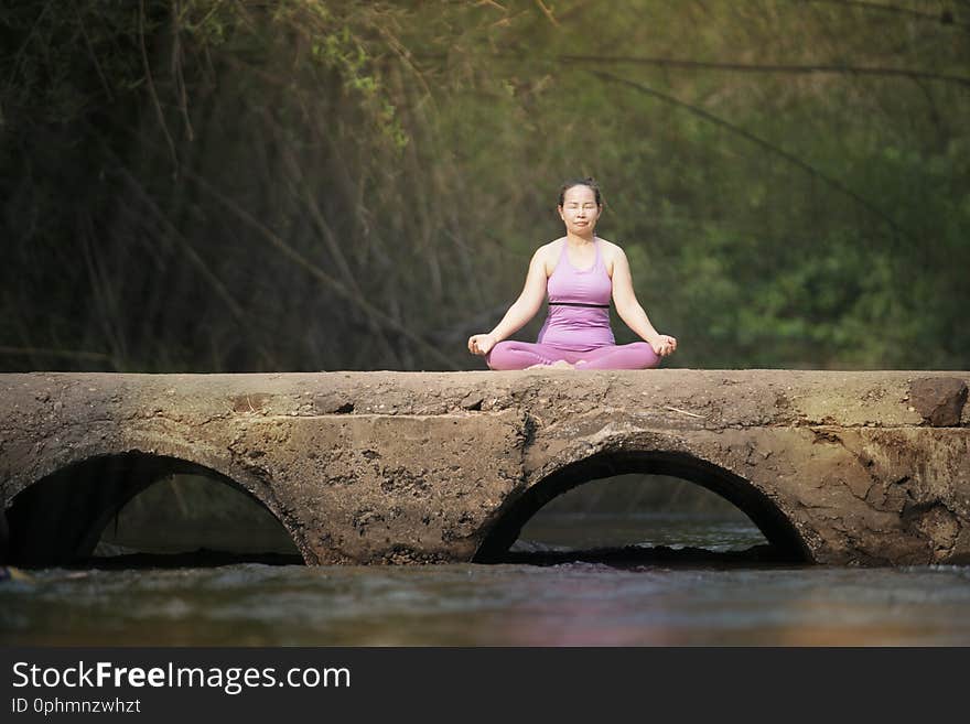 Woman practice yoga with nature