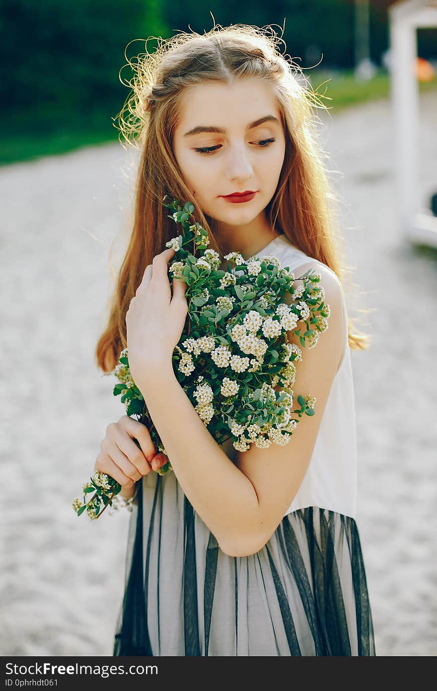 Young and pretty girl in a summer park