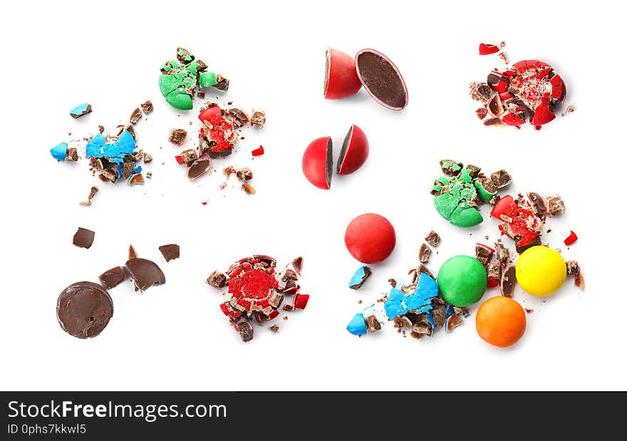 Set of crushed tasty colorful candies on white background