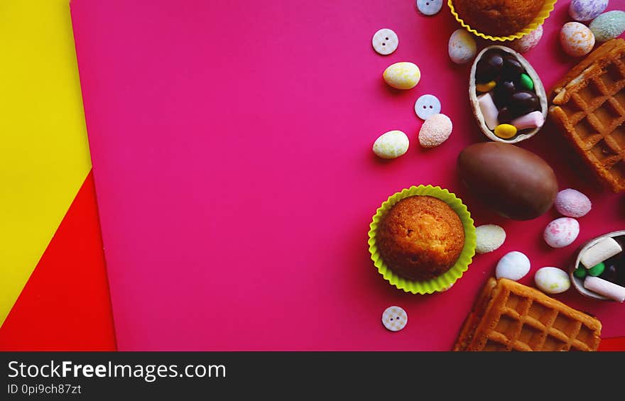 Decor Easter Eggs On Pink Background. Flat Lay, Top View. Easter Concept.