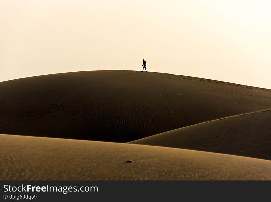 Men walking in the desert of gran canaria, spain