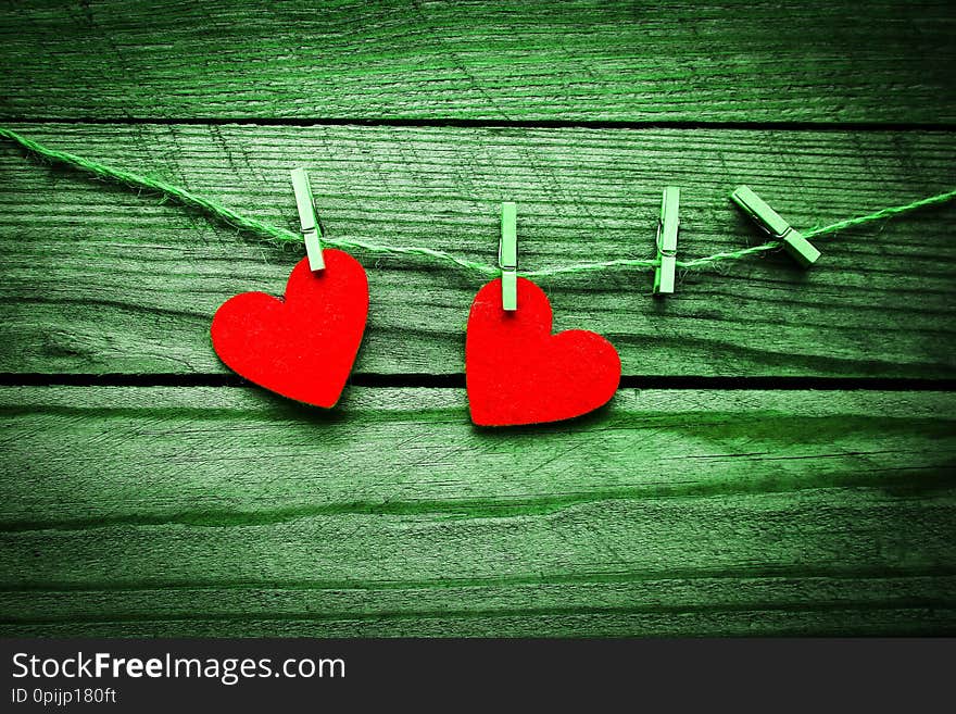 A happy valentine`s day in love and clothes pegs. A happy valentine`s day in love and clothes pegs