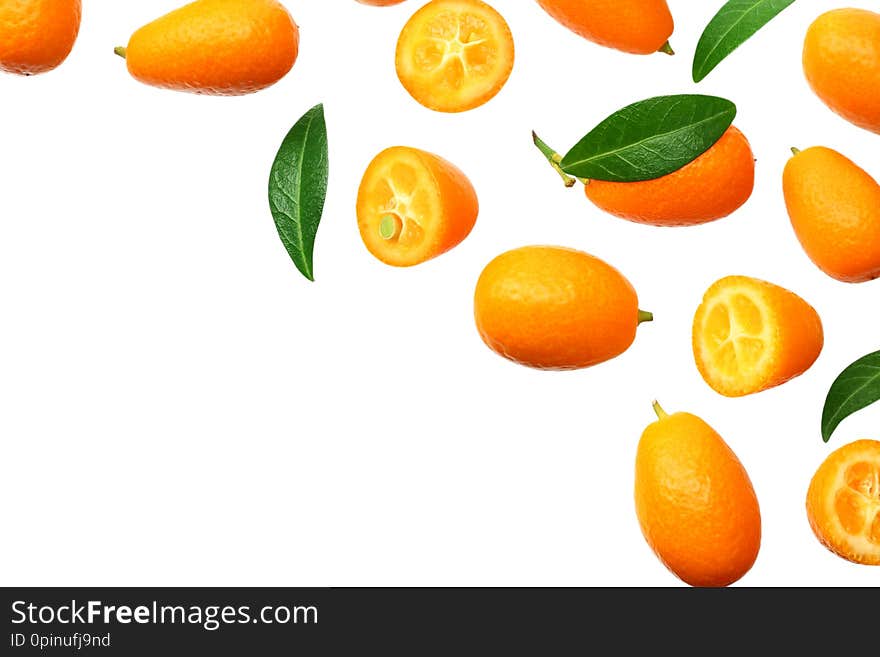 Cumquat or kumquat with leaves isolated on white background. top view