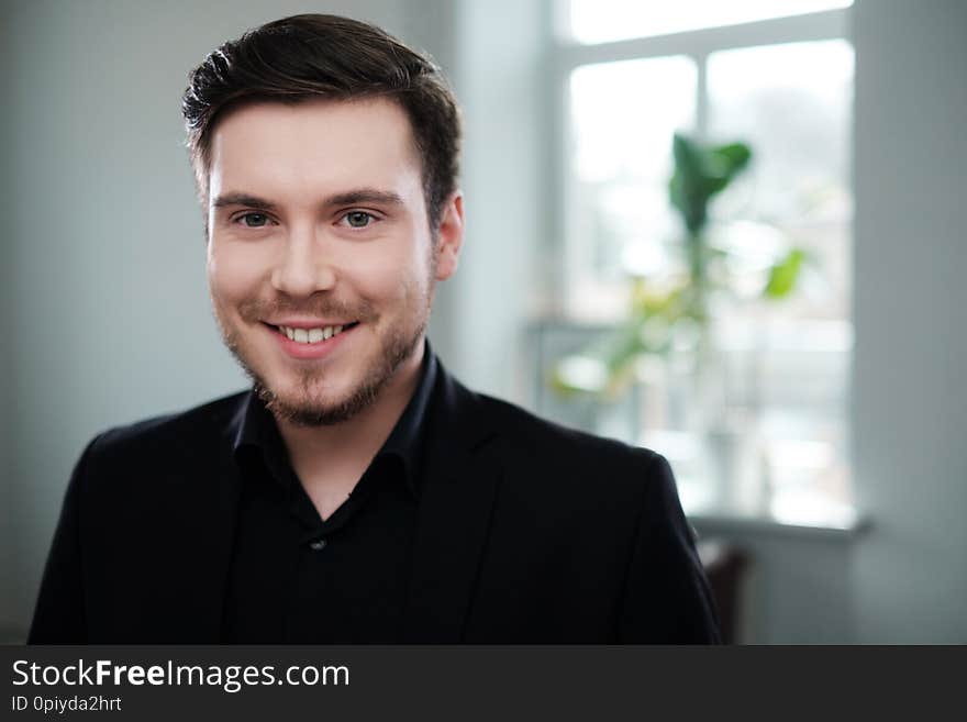 Confident young man attending job interview