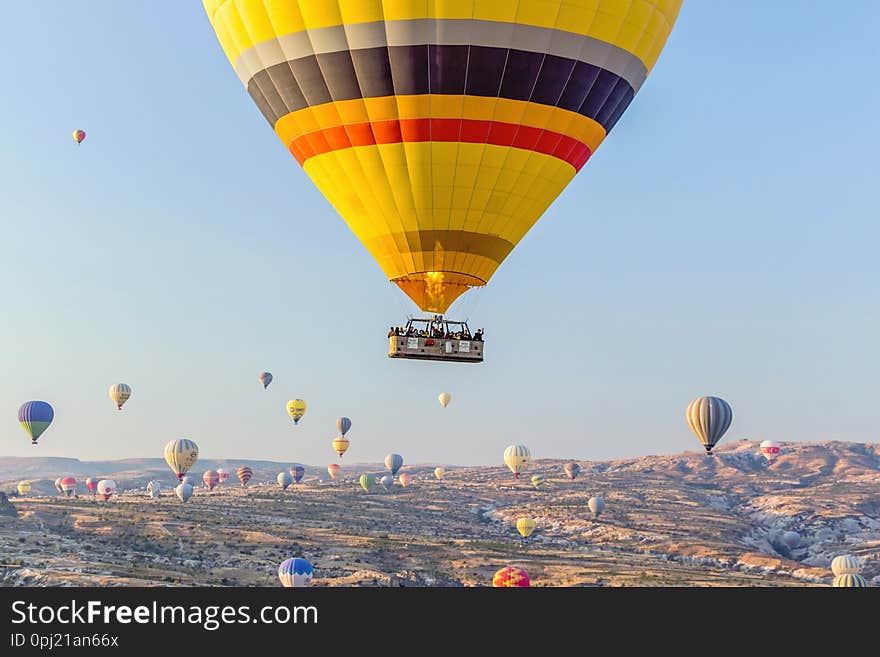 Hot air balloon in blue sky in Goreme Cappadocia