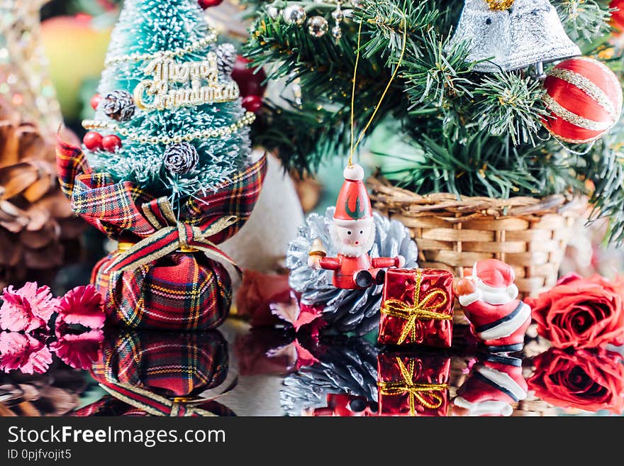 Christmas background with decorations and gift boxes on wooden