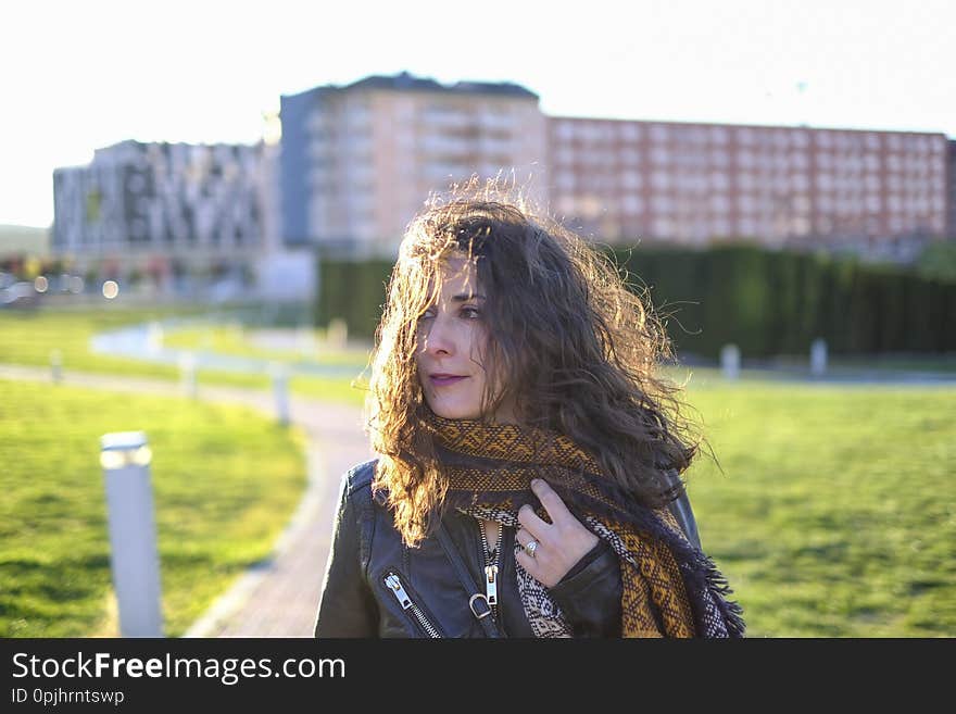 Winter woman portraits walking  in park