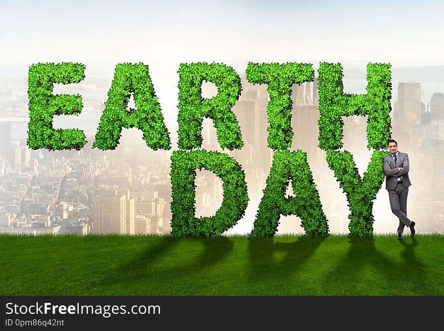 The businessman in earth day responsible business concept