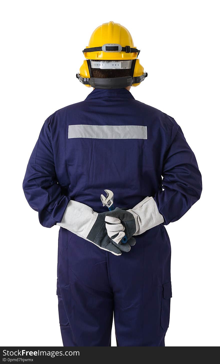 Back view portrait of a worker in Mechanic Jumpsuit is holding a wrench with helmet, earmuffs, Protective gloves and Safety goggles isolated on white background clipping path. Back view portrait of a worker in Mechanic Jumpsuit is holding a wrench with helmet, earmuffs, Protective gloves and Safety goggles isolated on white background clipping path