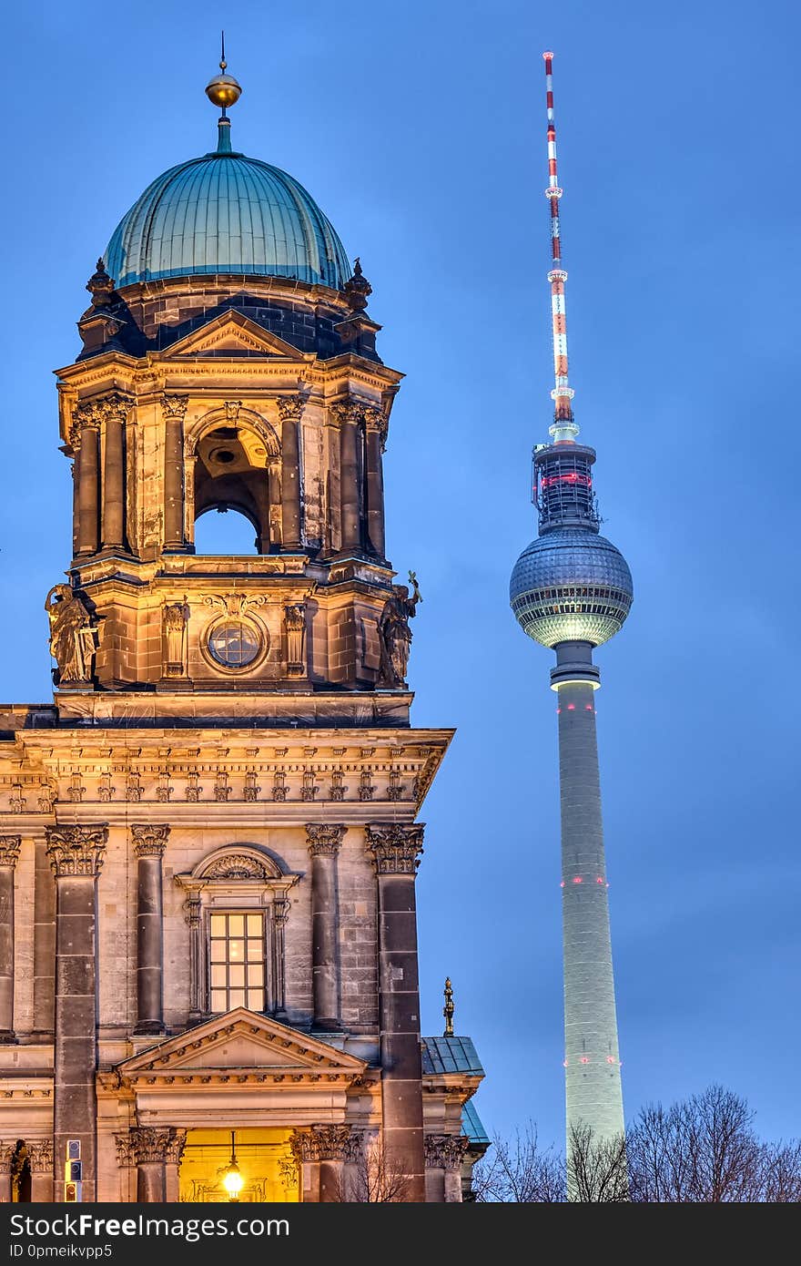 Detail of the Berlin Cathedral and the famous Television Tower at dusk