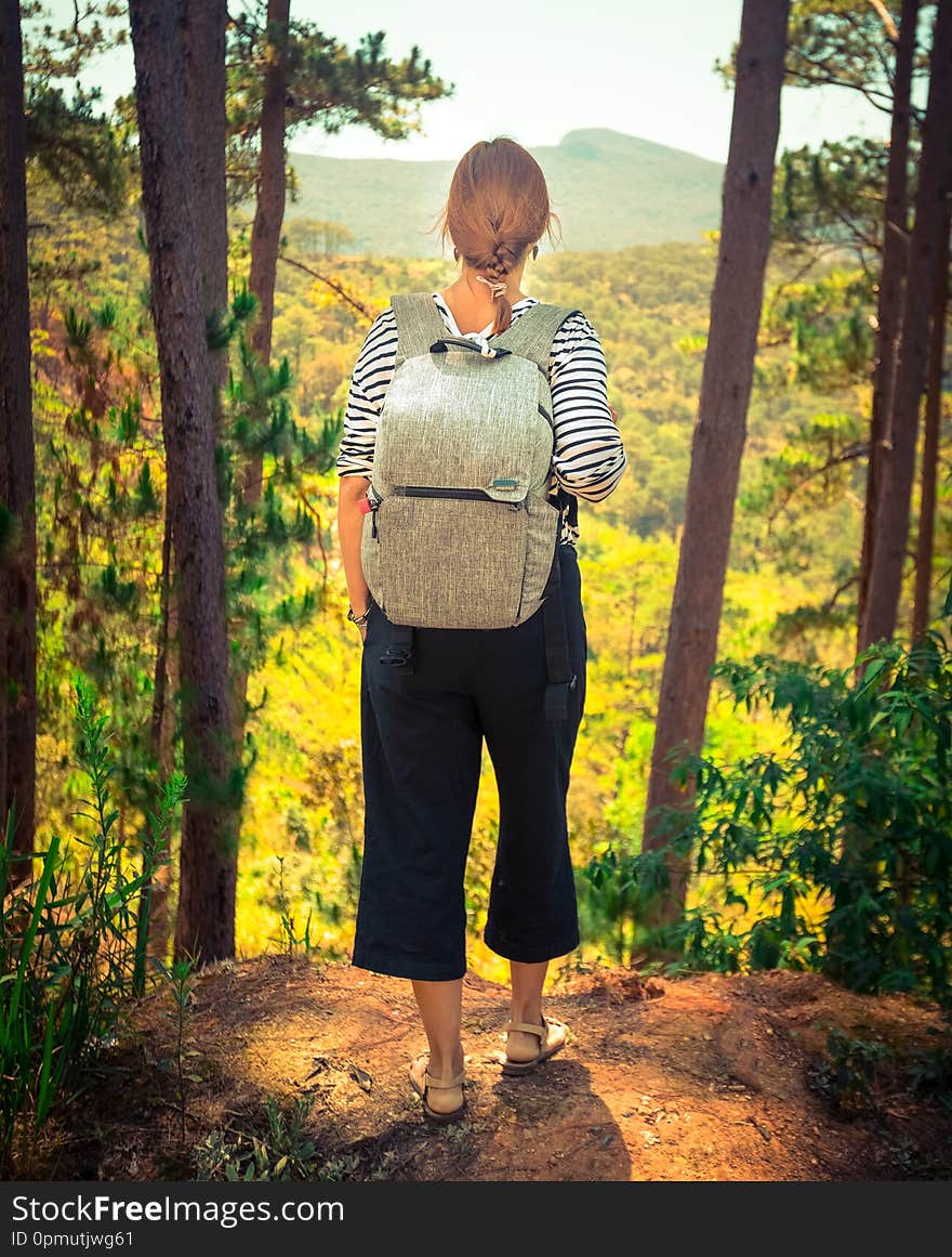 Tourist with backpack in highland, Dalat, Vietnam