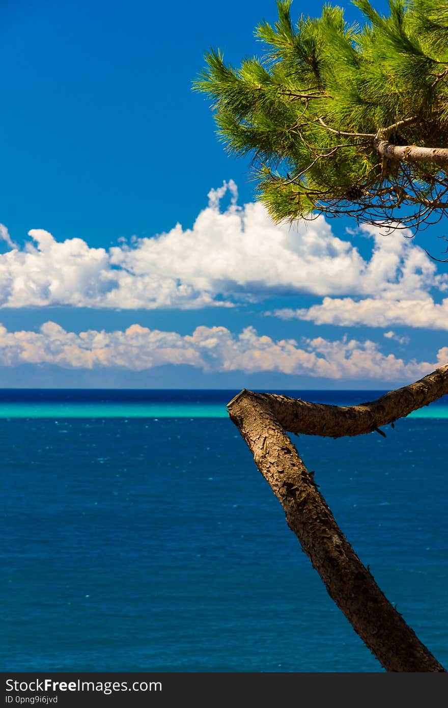 Tropical-like sea and sky in Italy in summer. Tropical-like sea and sky in Italy in summer