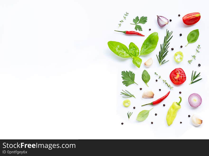 Various fresh vegetables and herbs on white background. Healthy eating concept