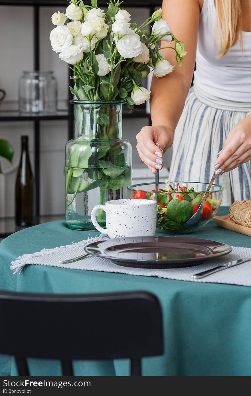 Housewife preparing salad