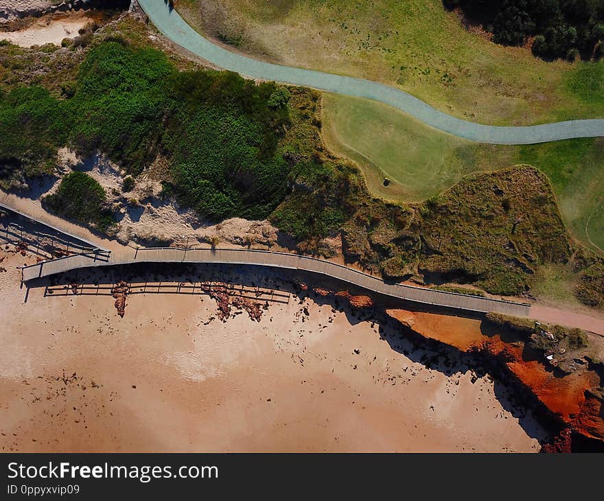 Top view aerial photo of beauty nature landscape with wooden pathways at Dee Why beach in winter day. Top view aerial photo of beauty nature landscape with wooden pathways at Dee Why beach in winter day