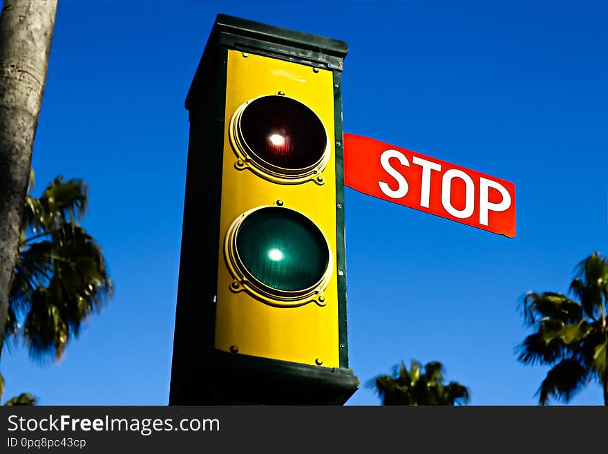 Traffic lights - green and red. Traffic lights with the stop sign.